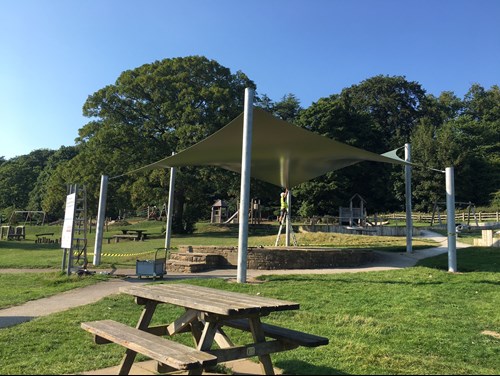 Shade sail being installed