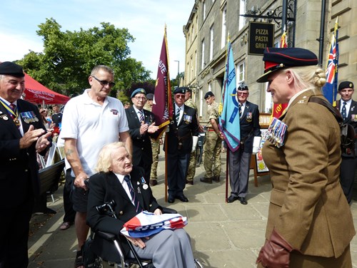 presenting the flag